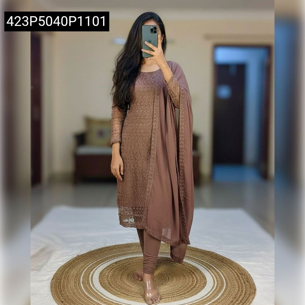 Woman posing in a stunning Lavender Chikankari Net Kurti Set with Georgette dupatta