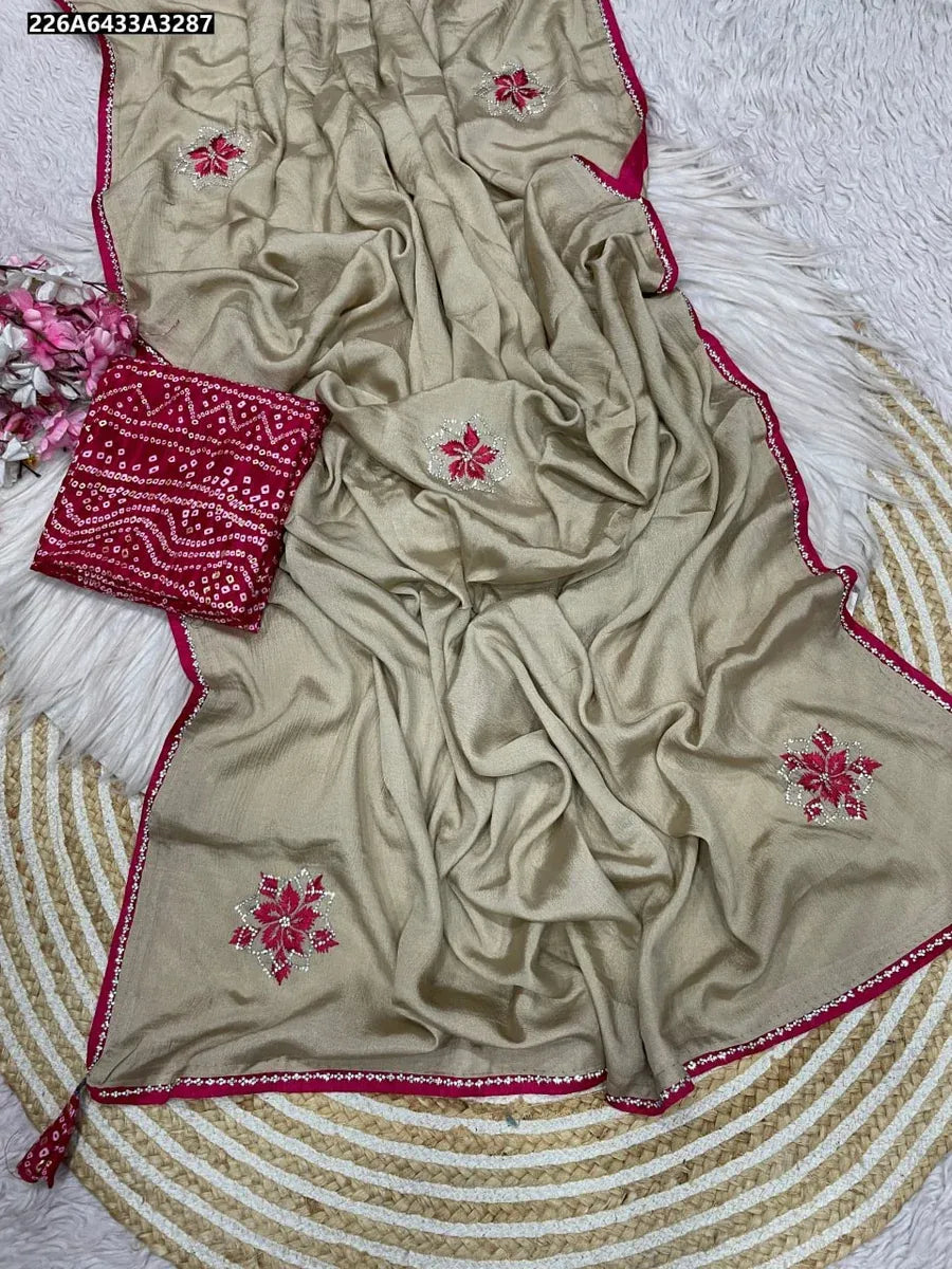 TRENDBUY Chinnon Saree in Beige with Multi Embroidery and Jarkhan Work, showcased with a Bandhani Print Blouse