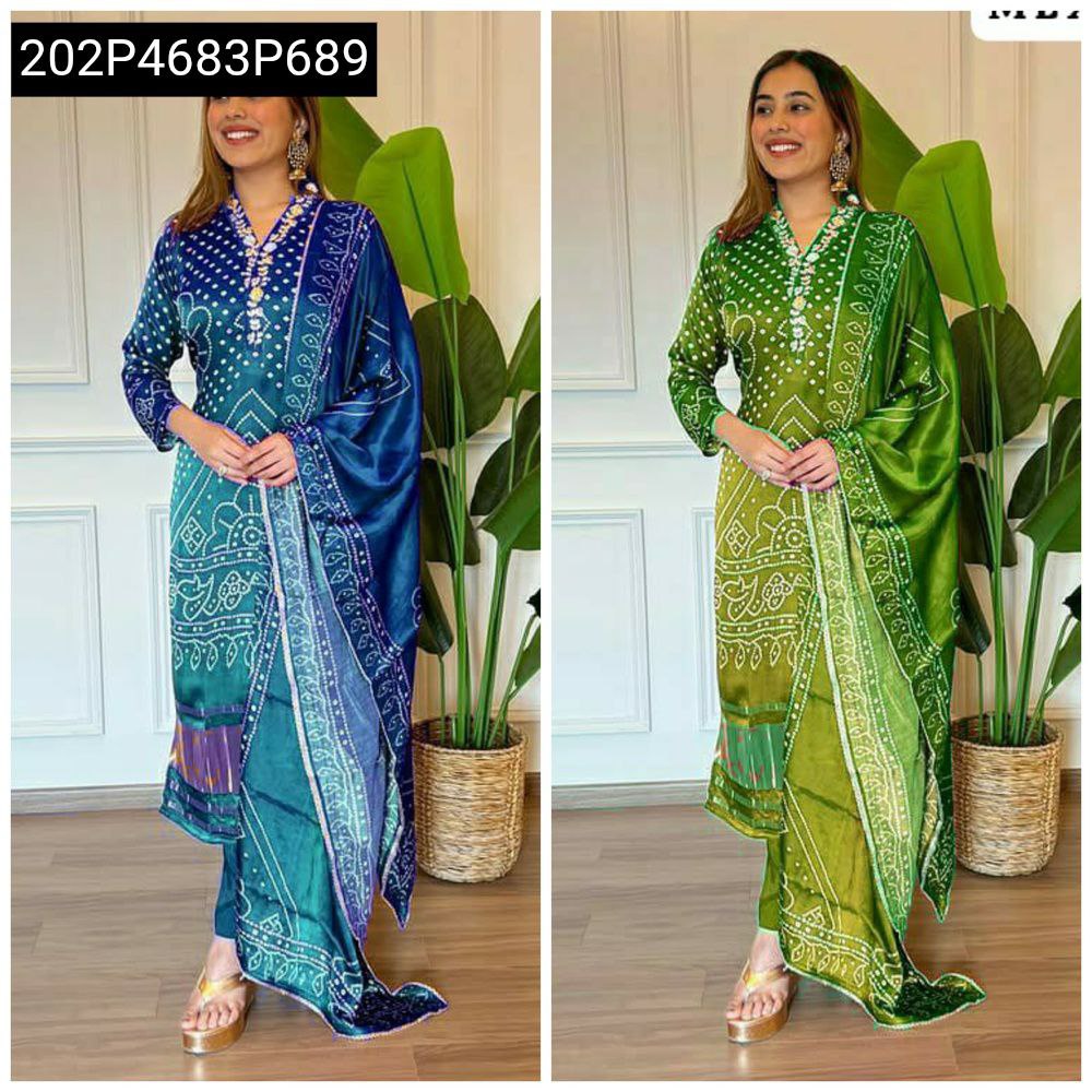 Woman wearing a blue-green ombre Chinon silk kurti set with digital print and embroidery, posing with plants.