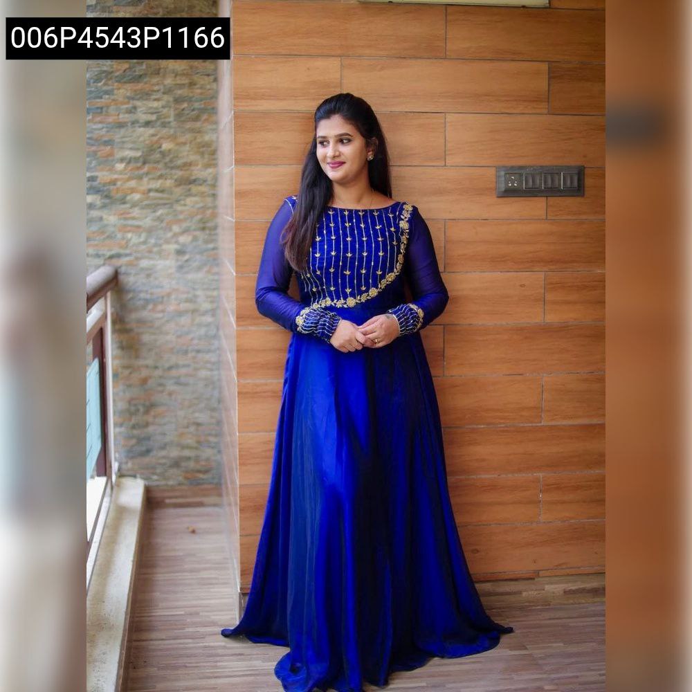 Women wearing a royal blue georgette gown with gold embroidery, posing elegantly.