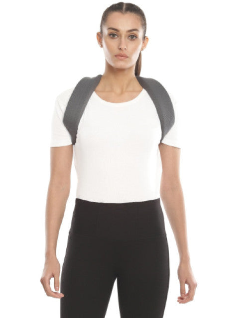 Large beige clavicle brace with adjustable Velcro straps