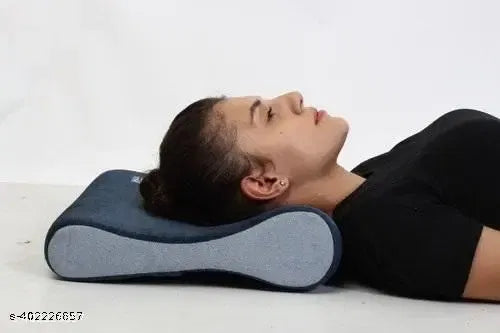 Ergonomic contoured cervical pillow designed for neck pain relief and shoulder support.