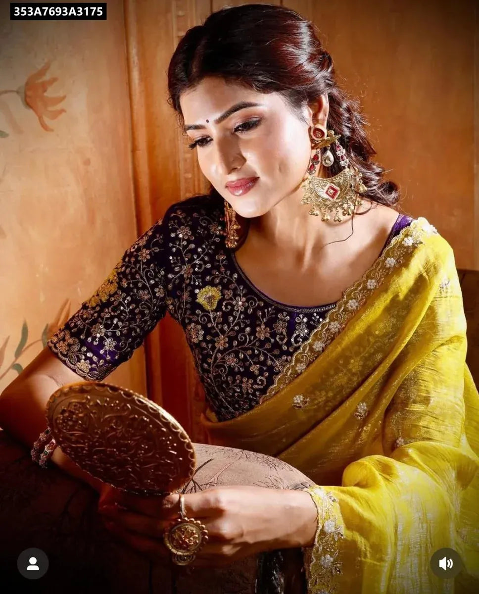 Model wearing a Mustard Yellow Crunchy Chiffon Crush Silk Saree with a Deep Purple embroidered blouse, showcasing the elegant drape and design