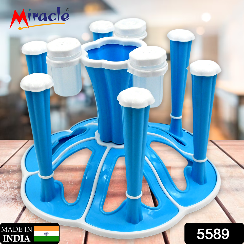 White plastic Miracle Glass Stand for 6 tumblers with 3 pepper salt shakers, ideal for kitchen or dining.