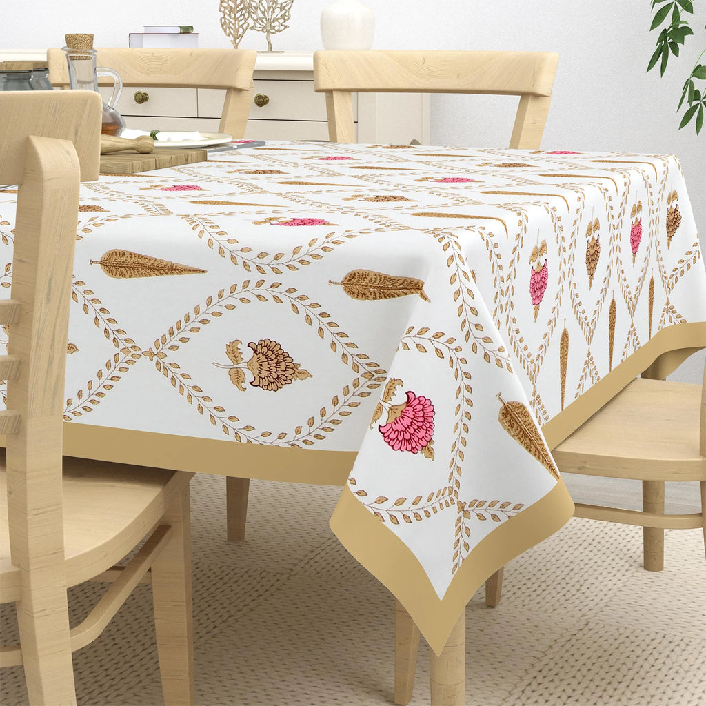 White canvas 6 seater dining table cover with pink and gold block print floral pattern