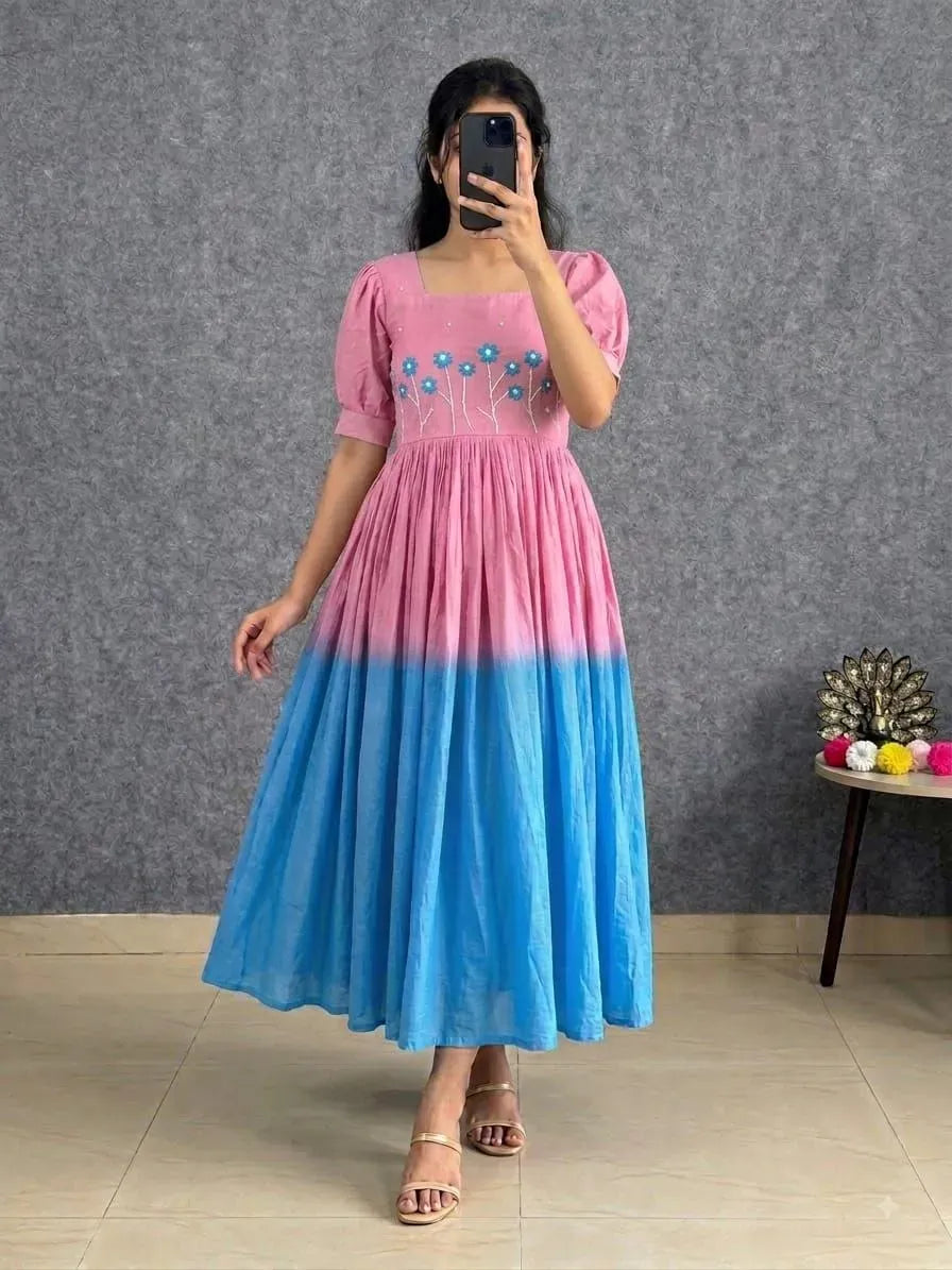 Model wearing pink and blue shaded cotton gown dress with short sleeves