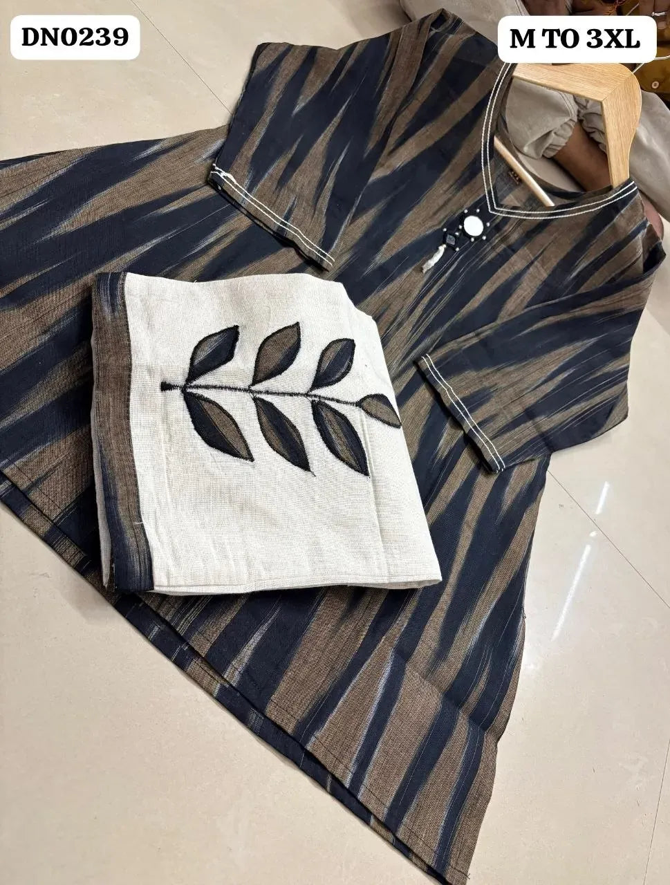 Black and brown cotton ikat short top with folded matching plazo featuring embroidered leaf motif
