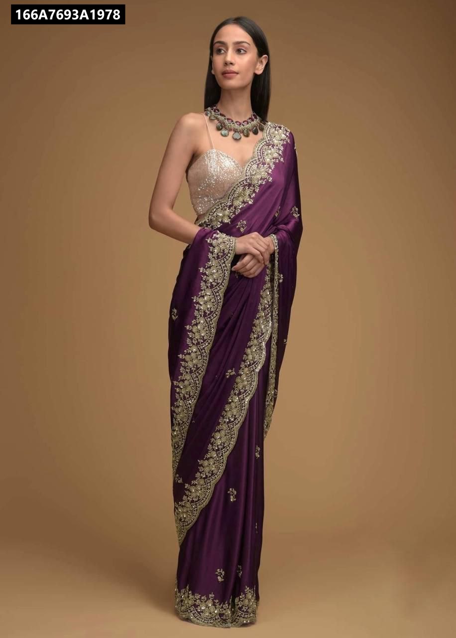 Model showcasing TRENDBUY Deep Purple Embroidered Rangoli Silk Saree with heavy C-pallu work, front view.