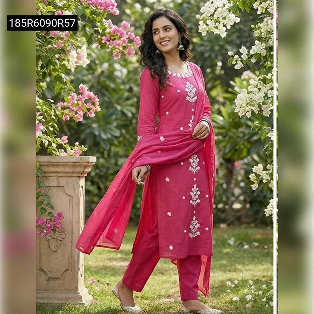Woman in Rani Pink Embroidered Roman Silk Kurti Pant Dupatta Set, front view with flowers