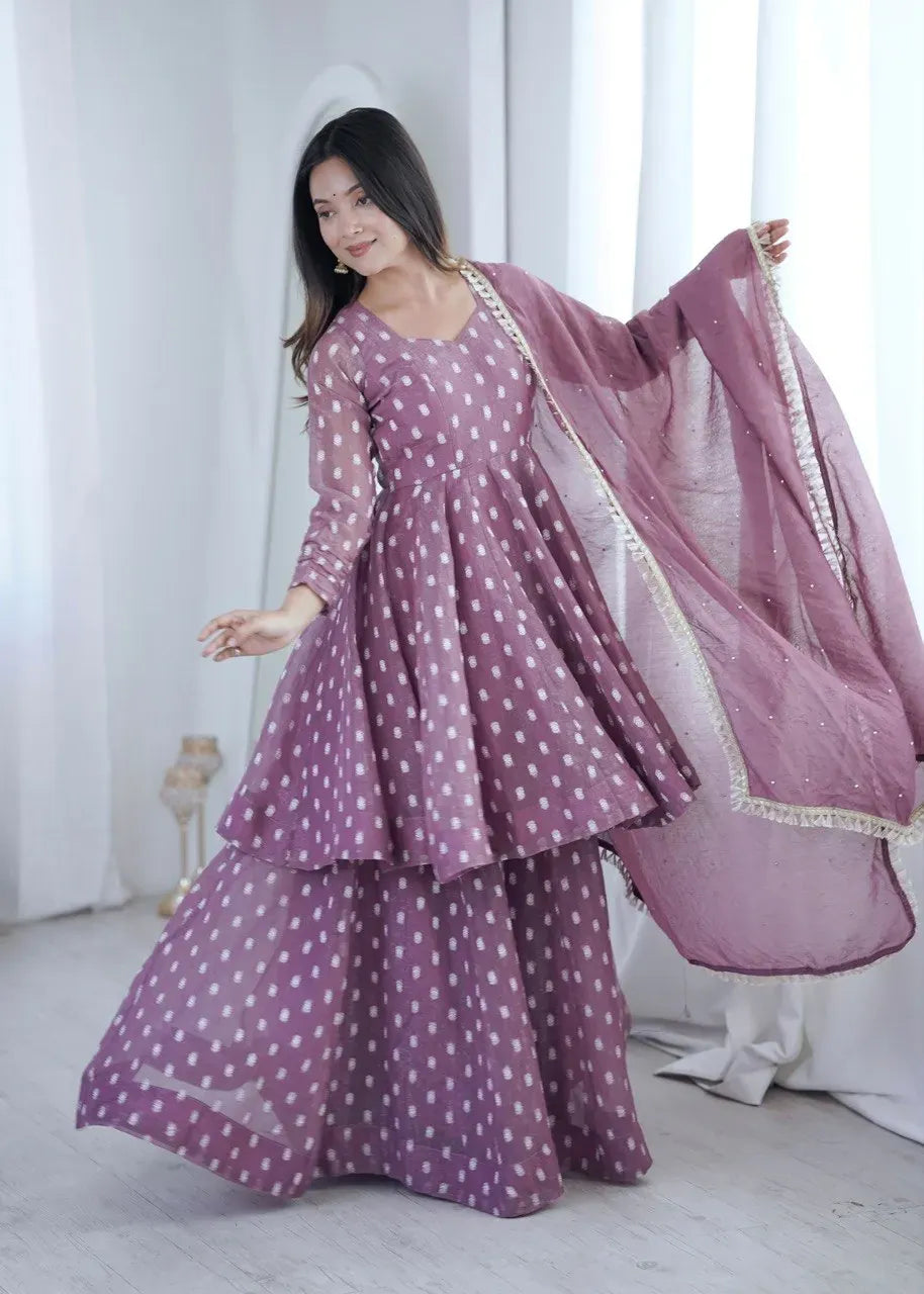 Full body shot of model wearing purple jacquard butti sharara set