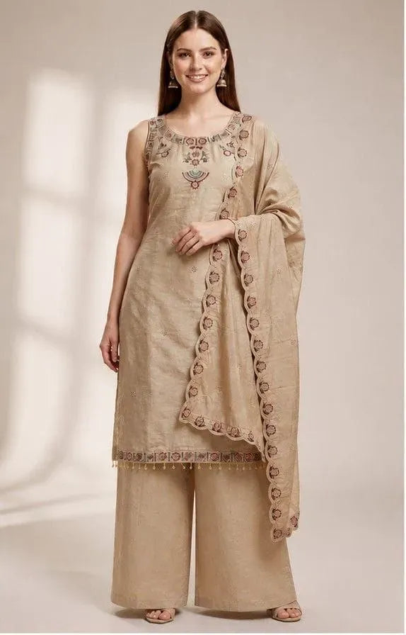 Full body front view of woman in elegant beige festive suit set