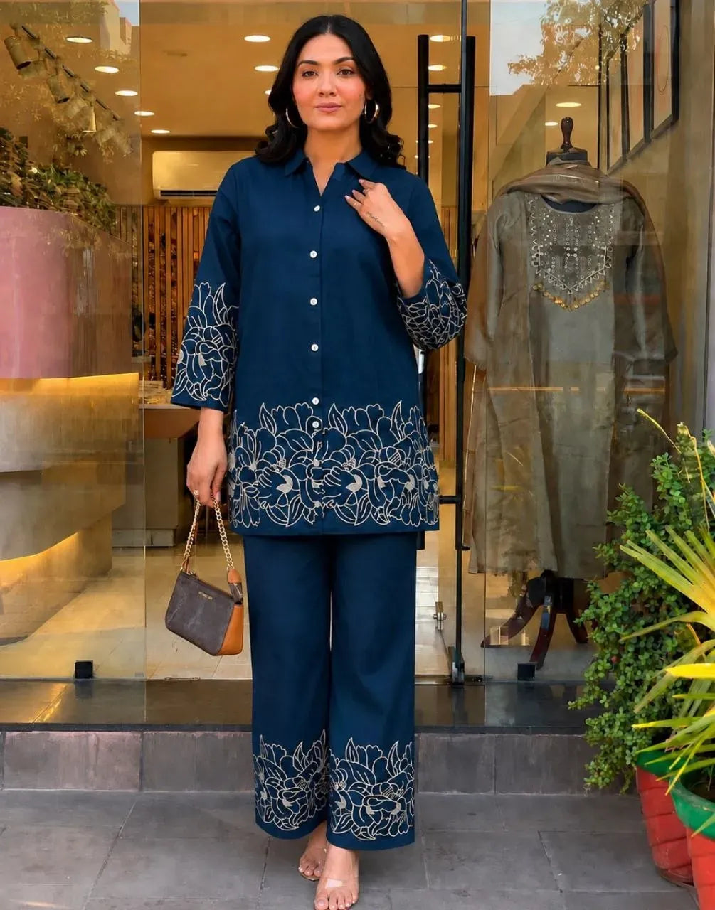 Model wearing dark blue heavy embroidered rayon cord set with palazzo