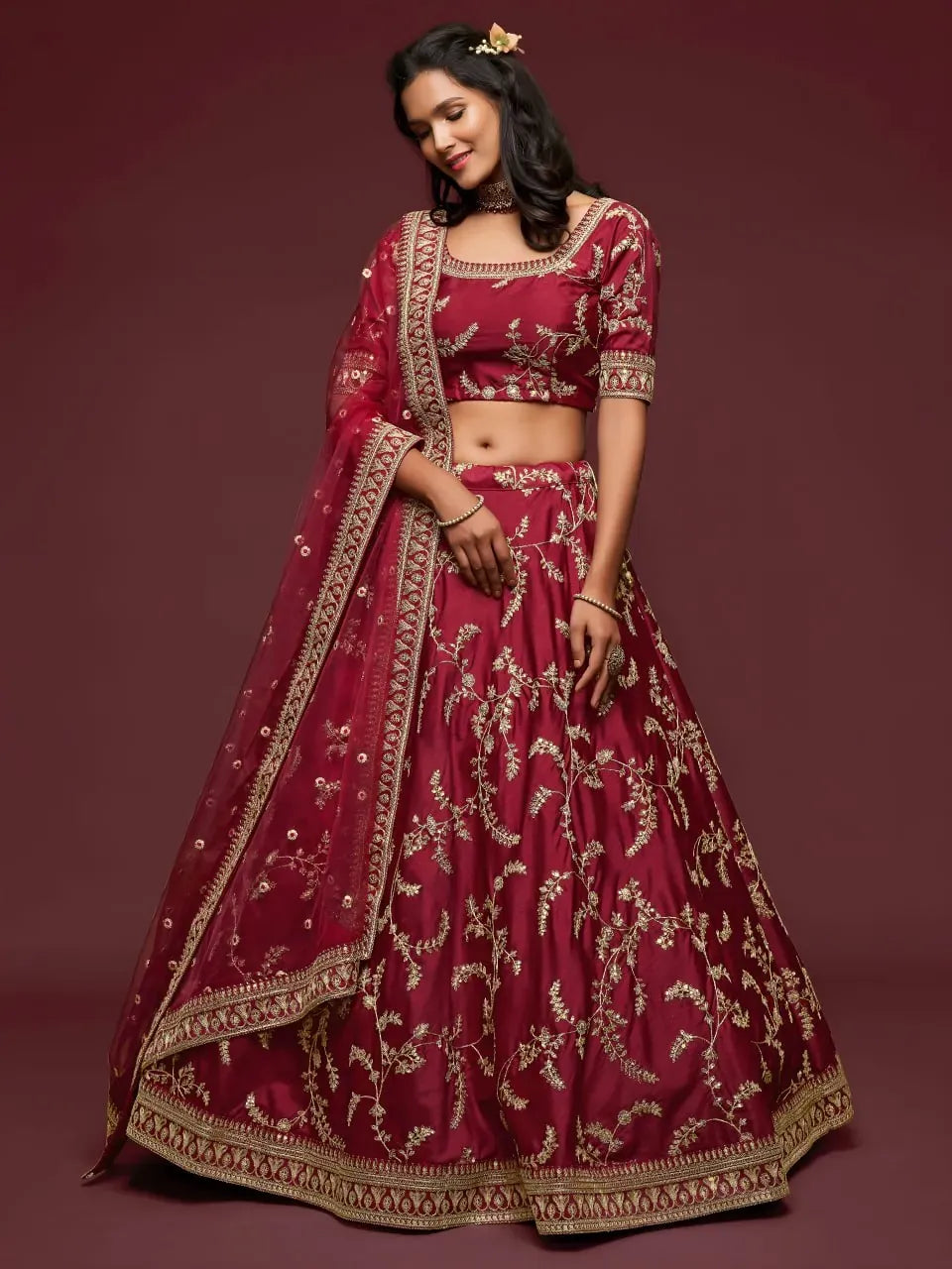 Full body front view of model in maroon art silk lehenga choli