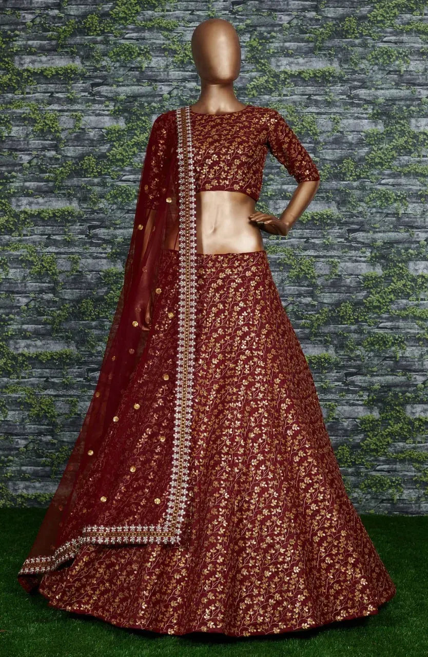 Full body view of maroon sequin lehenga choli on a mannequin