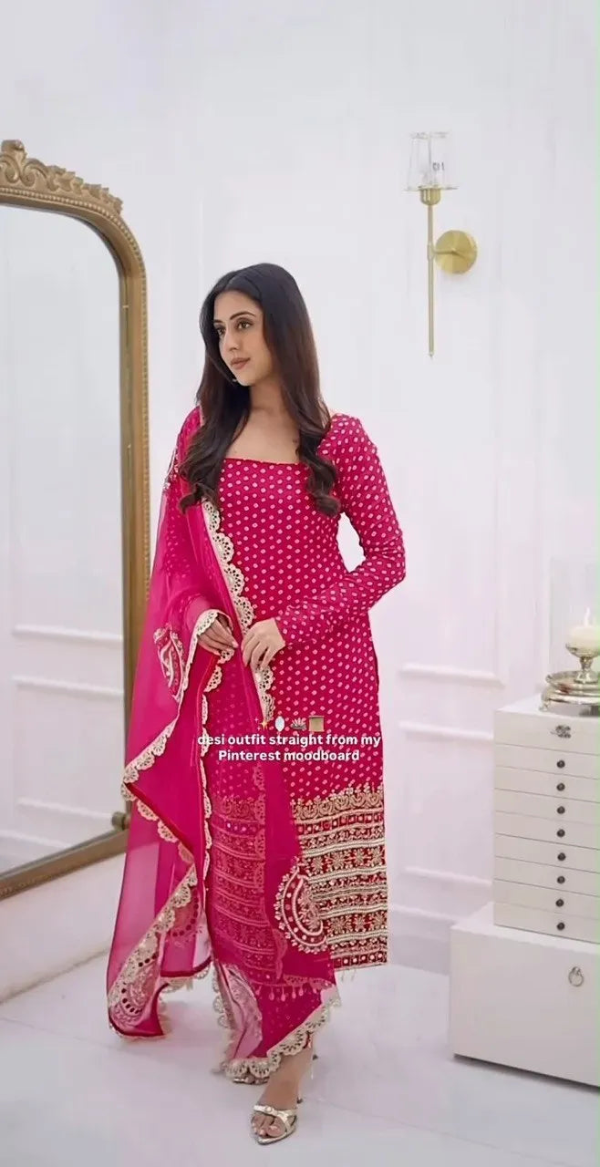 Front-facing full body shot of model wearing pink georgette top and palazzo set with dupatta