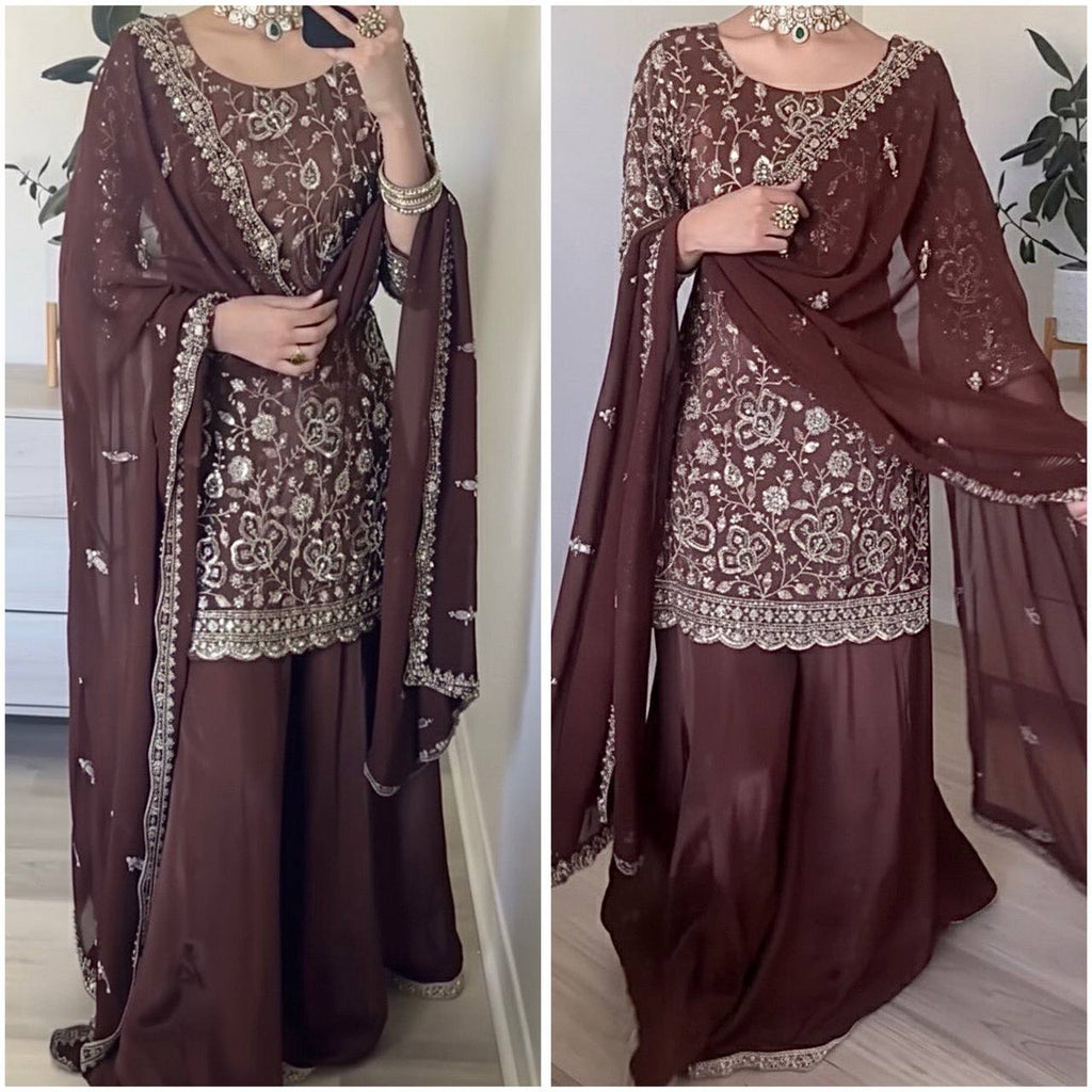 Woman posing in a mirror, wearing a deep maroon embroidered Top-Plazzo and Dupatta set.