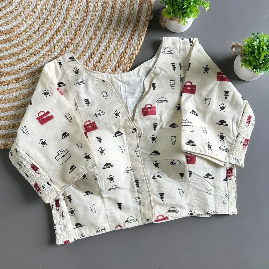 Off-white pure cotton block print blouse with red and black motifs flat lay