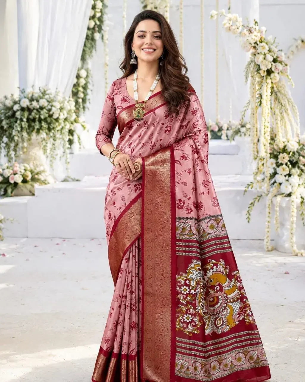 Full body view of model standing in pink Kalamkari print soft cotton saree