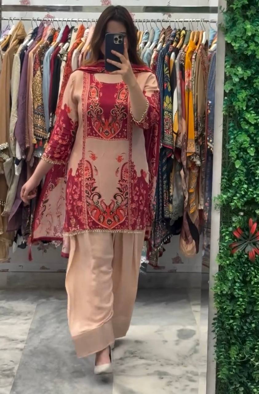 Model wearing Peach and Maroon French Crep Silk ready-to-wear suit with digital print and mirror work, paired with a matching dupatta.