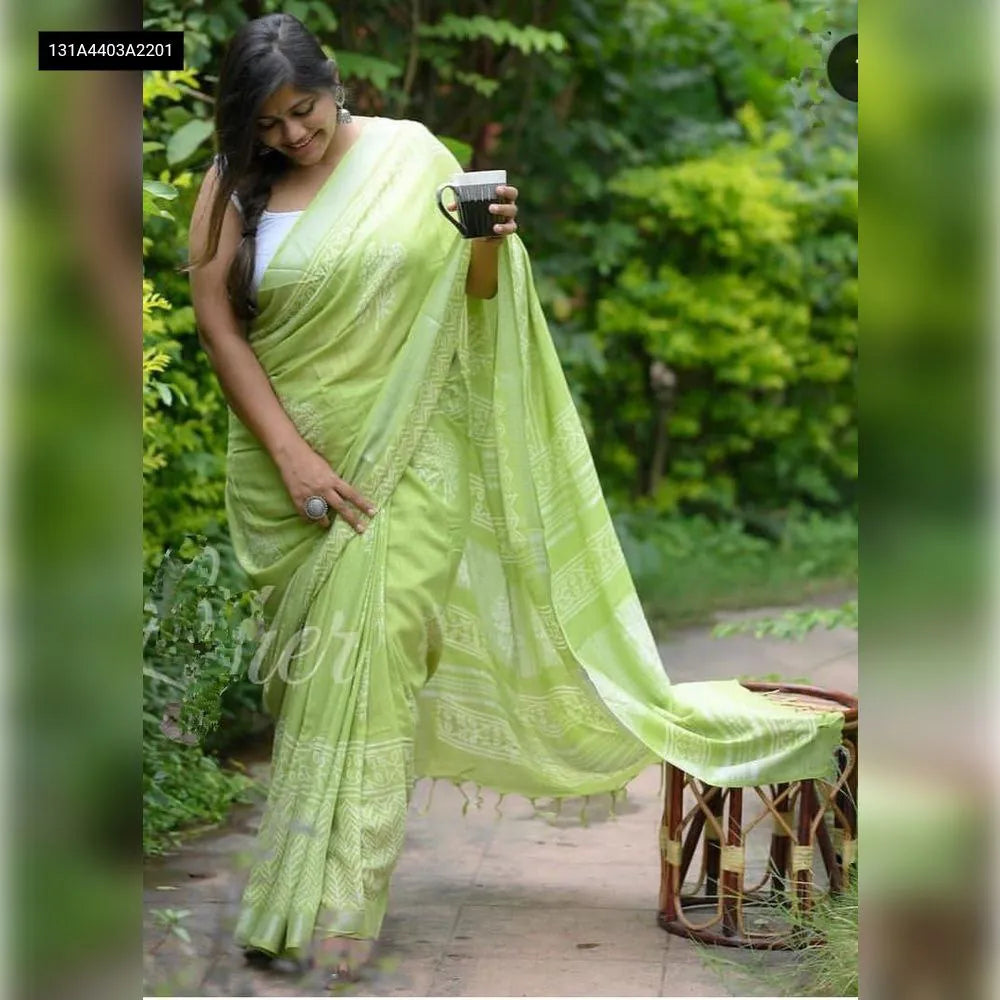 Model wearing a beautiful Lime Green Digital Print Linen Saree by TRENDBUY, featuring silver zari patta and extra latkan.
