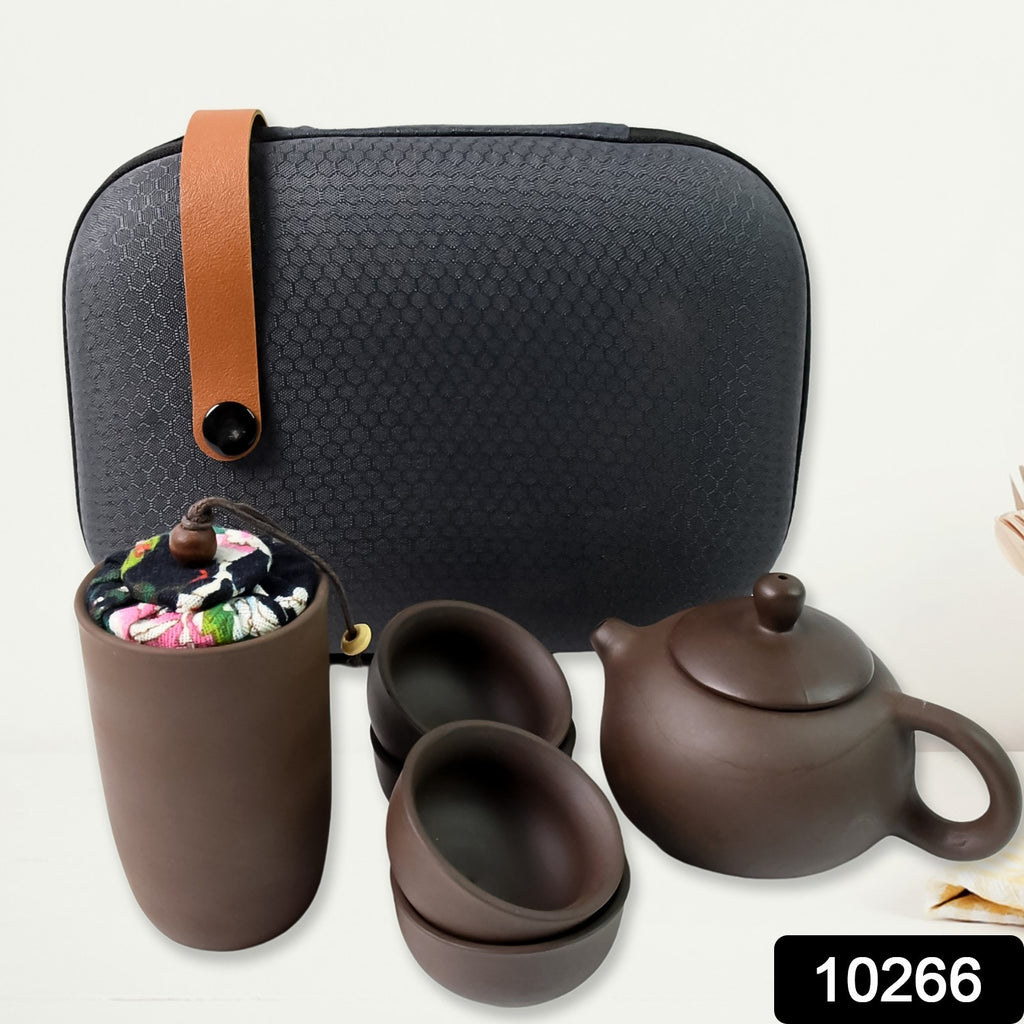 Portable 6-piece Kung Fu tea set in a travel bag, including a ceramic pot and cups.