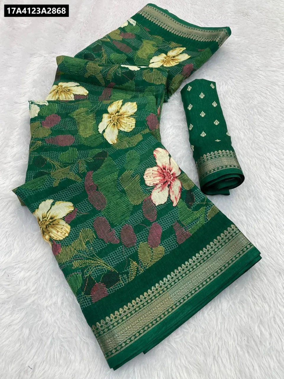 Green Dola Silk Saree with Kalamkari style floral print, jacquard border, and matching blouse fabric, displayed on a white textured background.