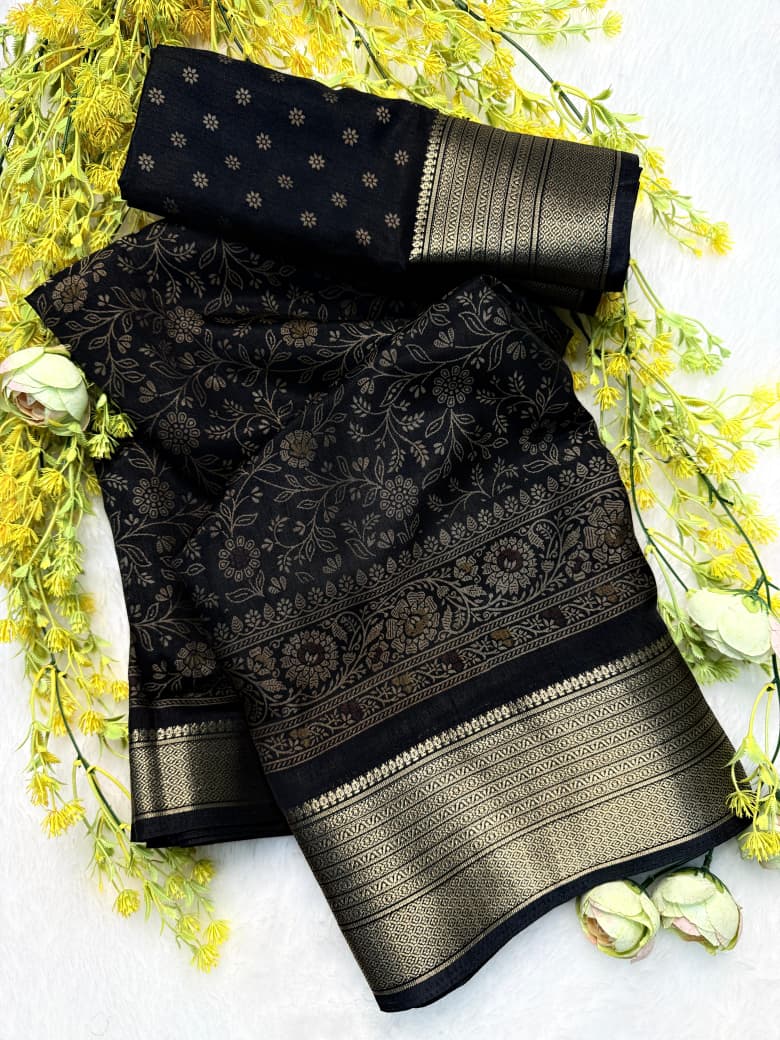TRENDBUY Dola Silk Saree in Black with gold Kalamkari design and Zari Hamsa borders, laid flat with matching blouse.