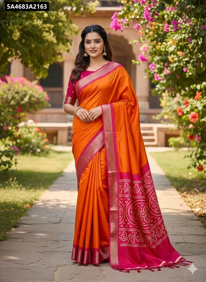 TRENDBUY Orange Dola Silk Saree with Pink Jequard Border, full body model shot in garden