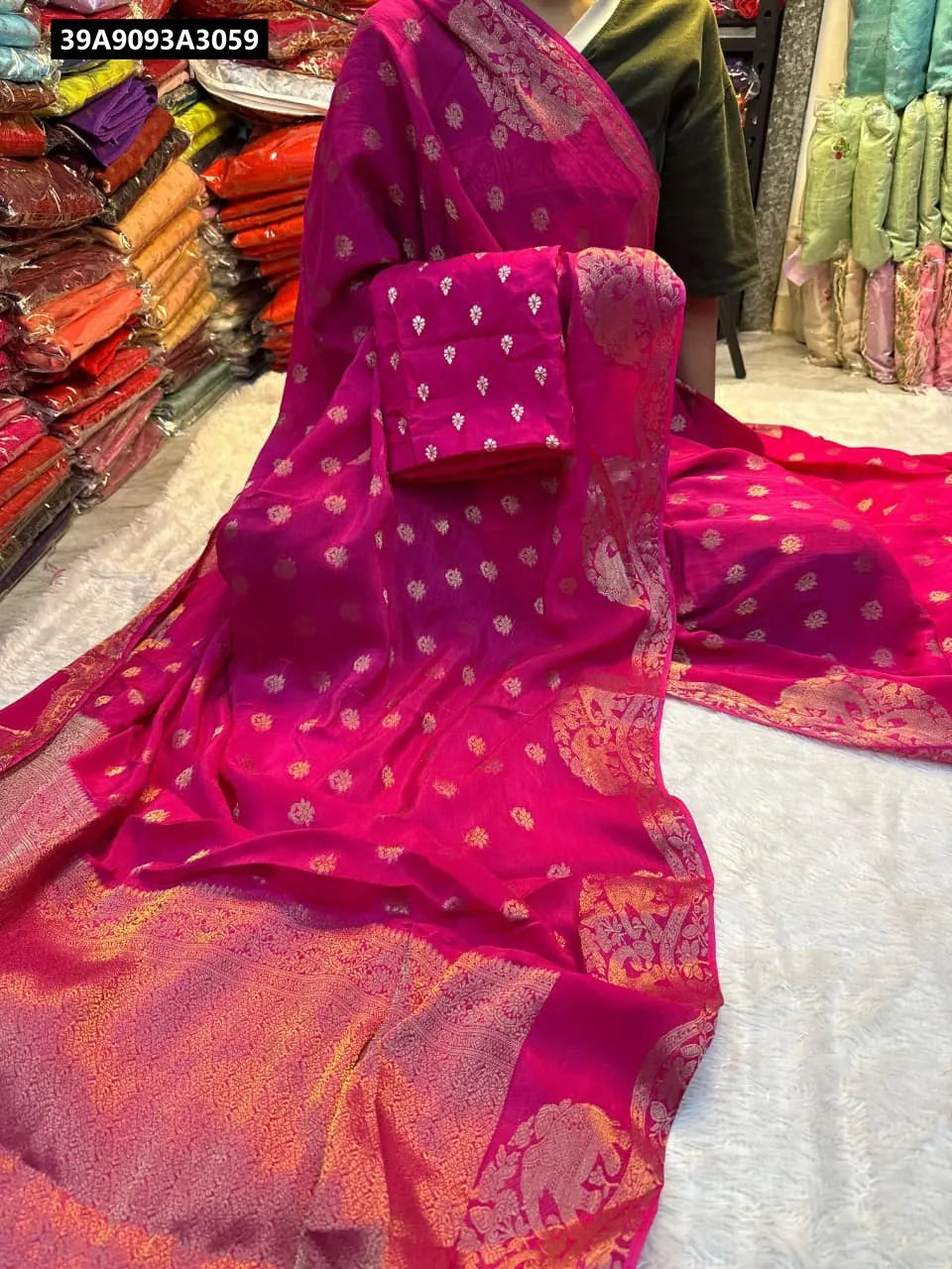 Model showcasing TRENDBUY Hot Pink Pure Viscose Dola Saree with Golden Weave and Jacquard Blouse