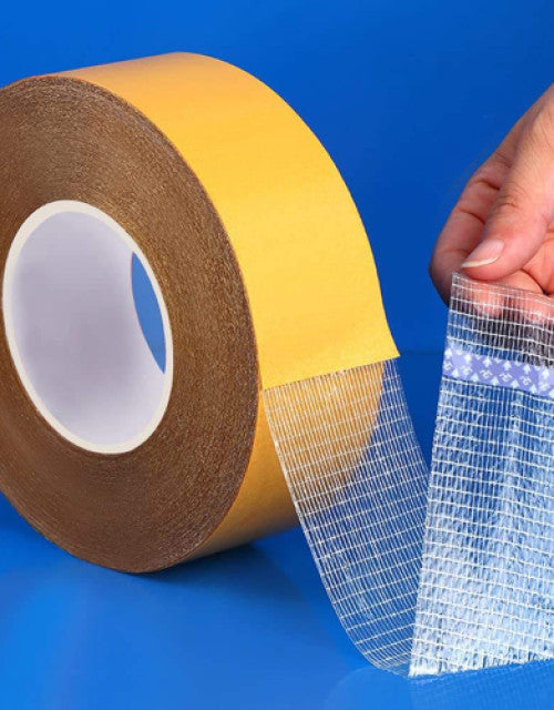 Clear heavy-duty double-sided fiberglass mesh mounting tape, strong wall adhesive.
