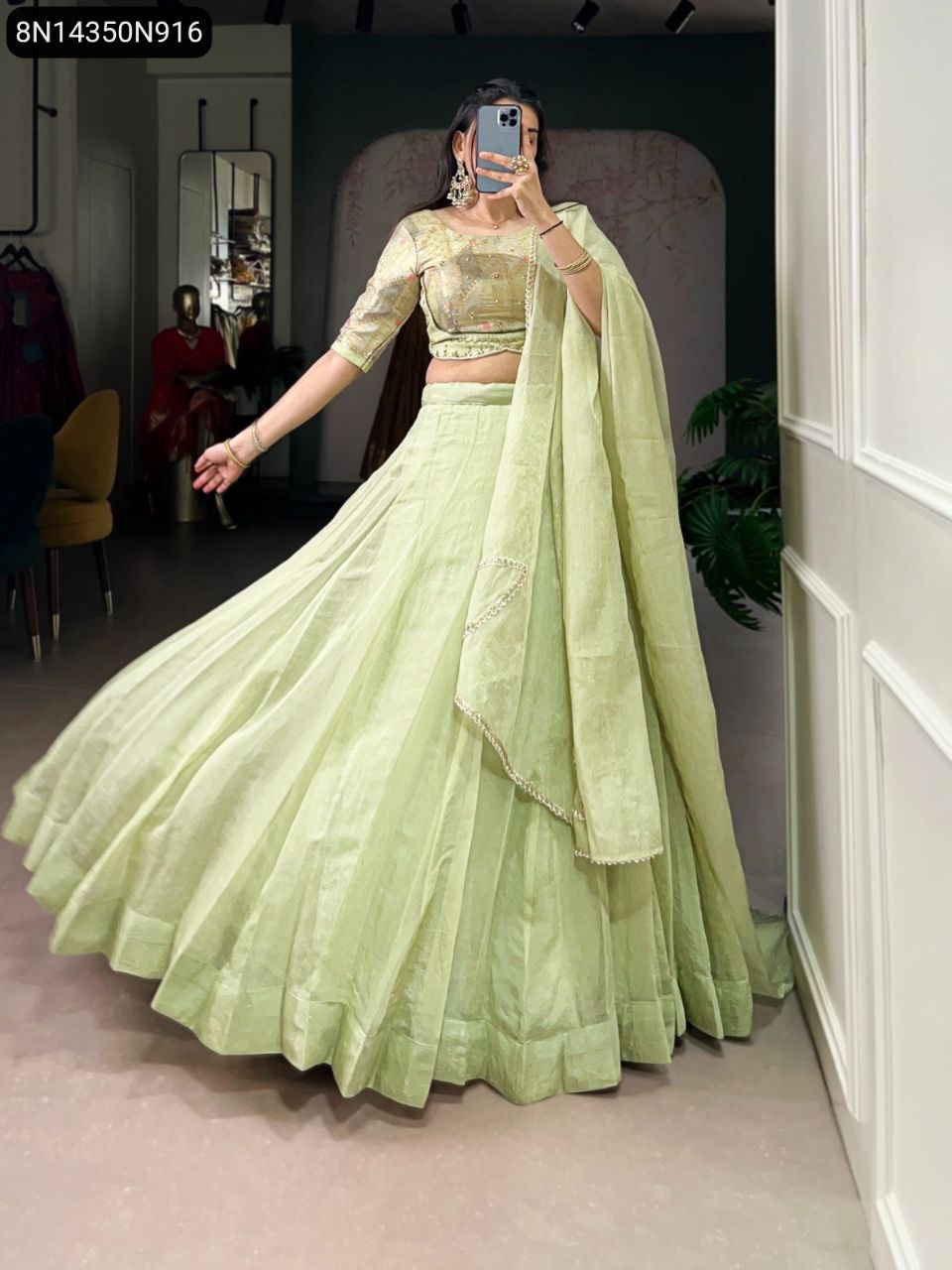 Woman in tea shade Allen Crush lehenga, front view, full body, showing flair