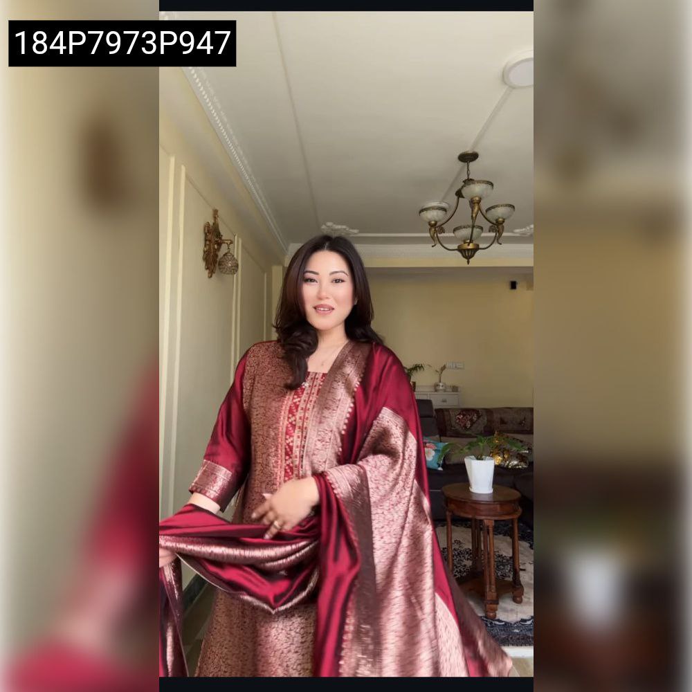 Model in maroon Banarasi suit set, front pose, looking forward