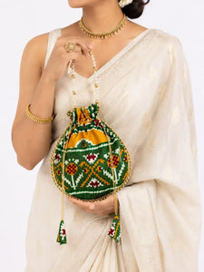 Elegant Patola Tussar Silk Potli Bag - Spacious Festive Bag with Pearl Handle