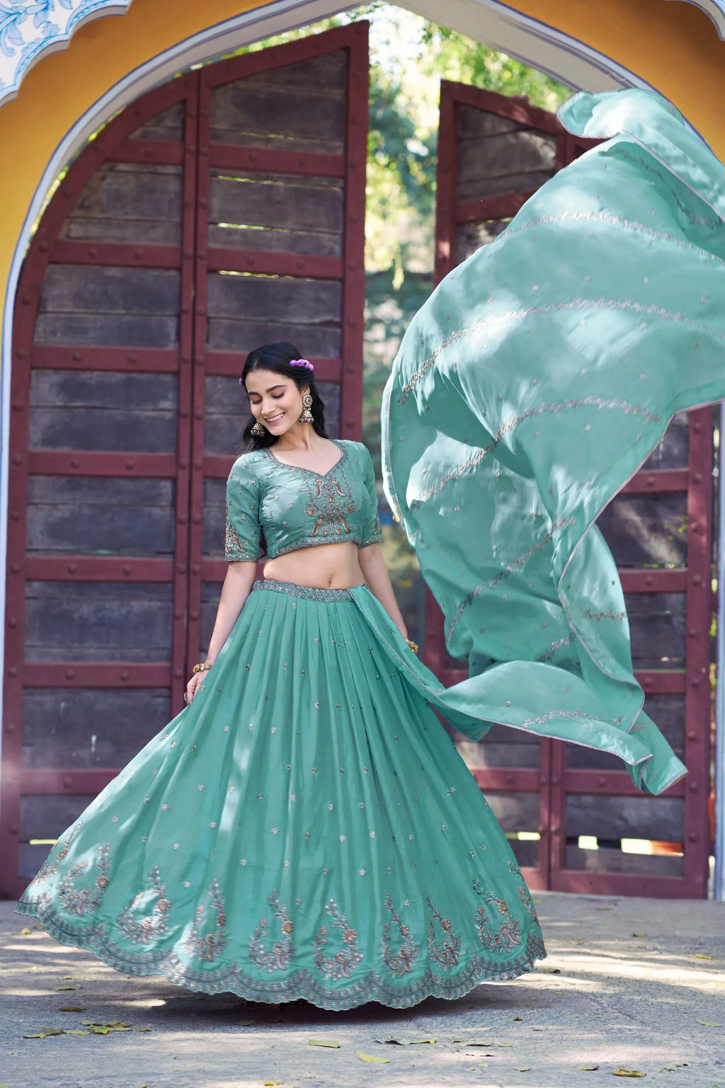 Teal Georgette Lehenga Choli with Heavy Zari Embroidery