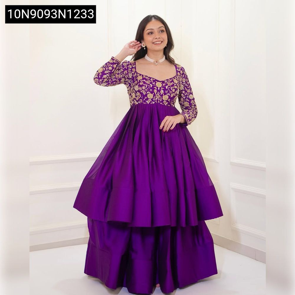 Model wearing purple Chinon Silk peplum lehenga set with sequins embroidery, front view