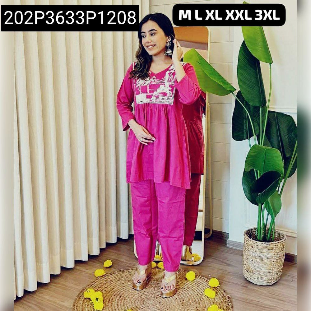 Model wearing Hot Pink Embroidered Cotton Cord Set, full body shot