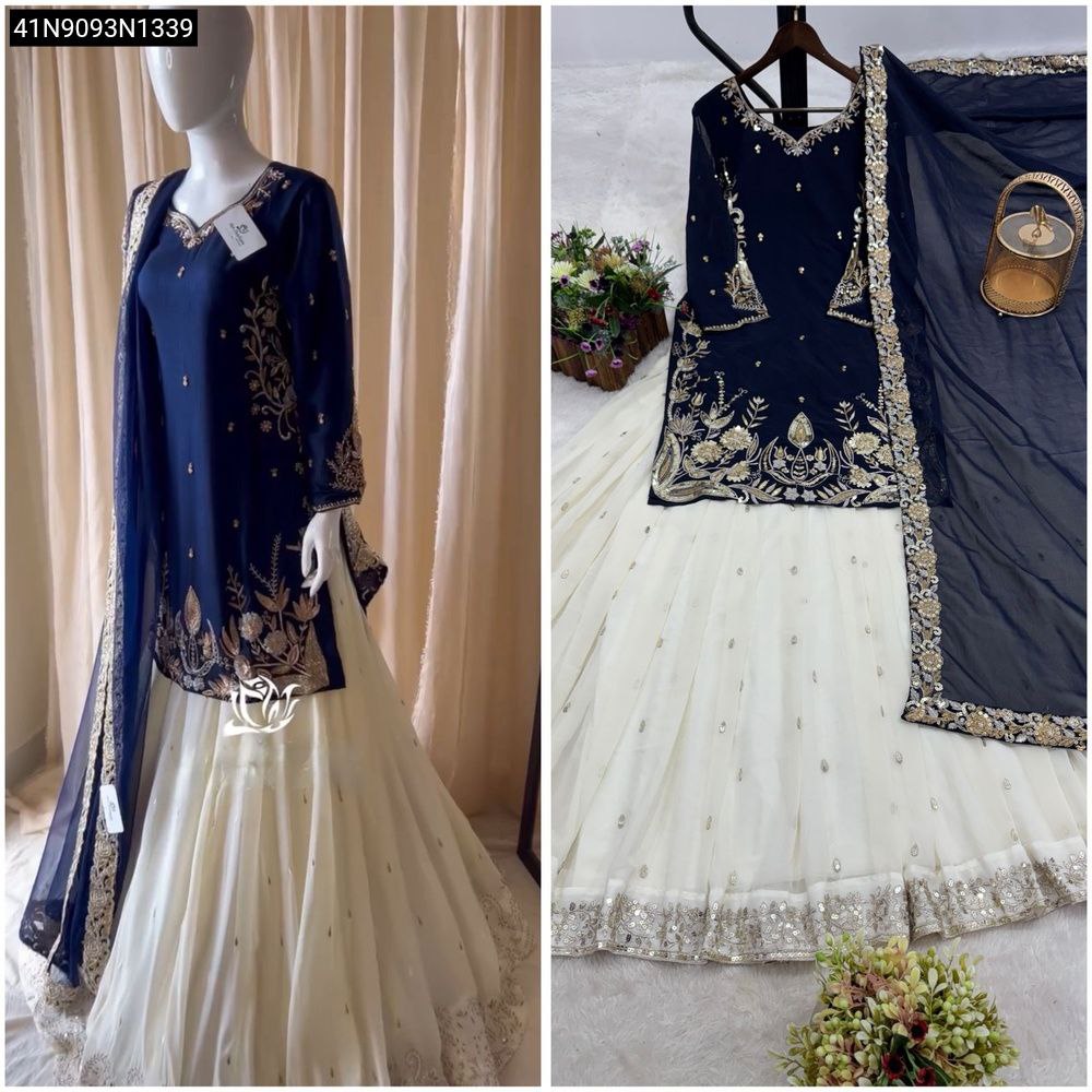 TRENDBUY Embroidered Faux Georgette Lehenga Choli Set in Navy Blue and White on a mannequin