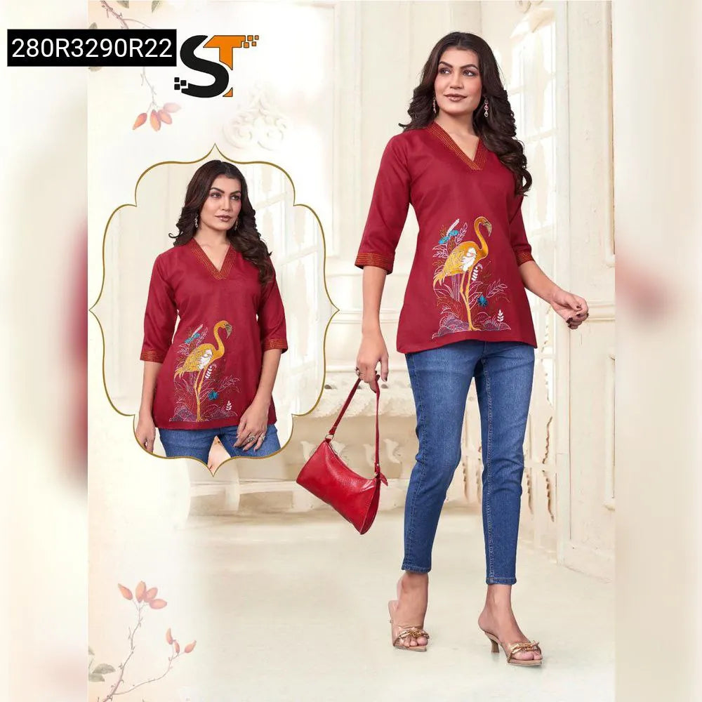 TRENDBUY model wearing a red slim fit short kurti with flamingo embroidery and denim jeans