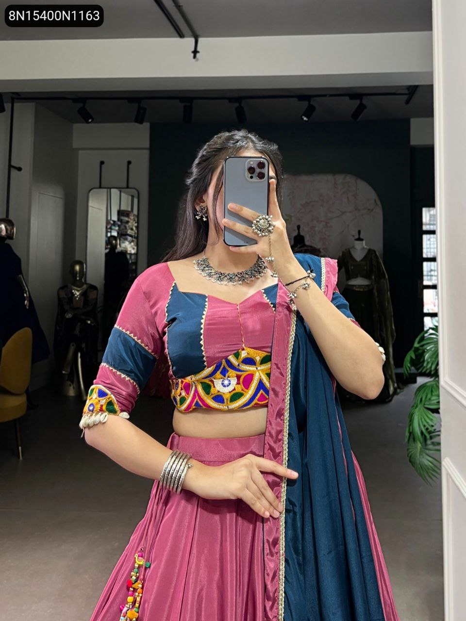TRENDBUY Rose Pink Silk Crepe Lehenga with Mirror Gamthi Work Blouse and Teal Dupatta, front view.