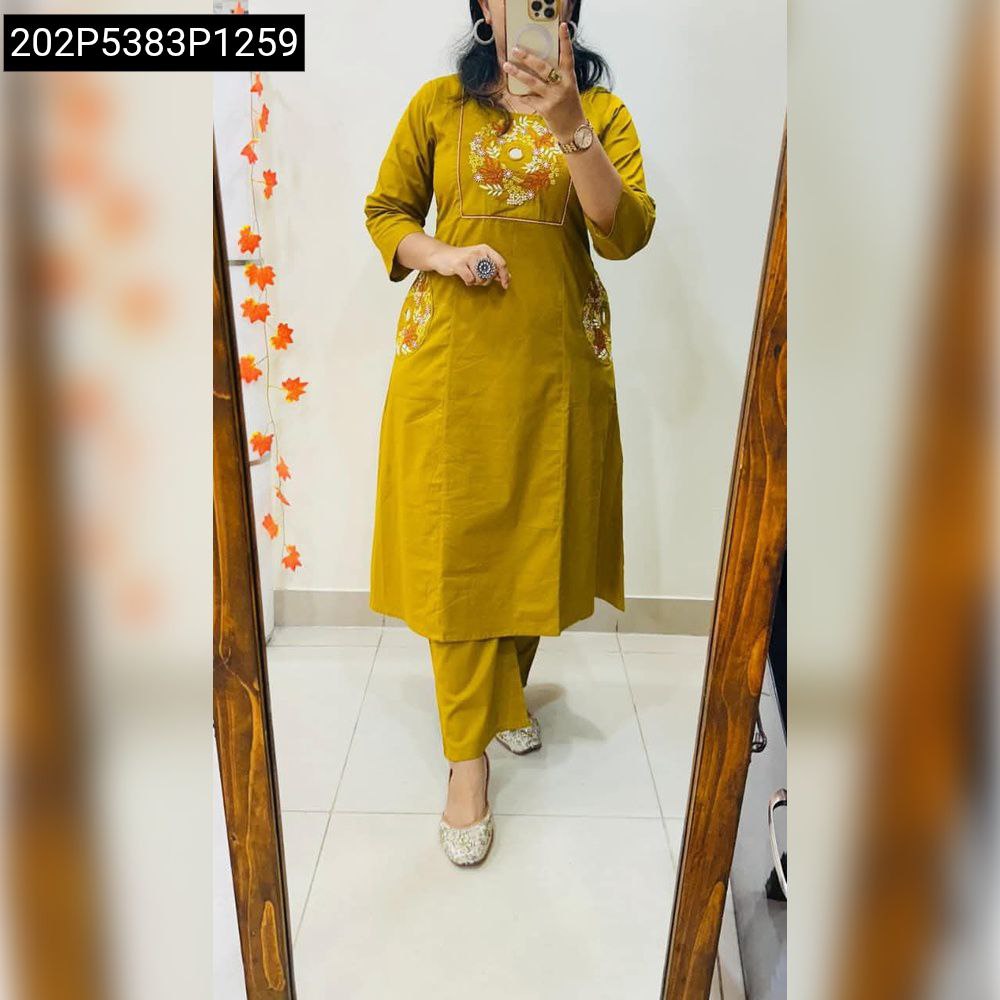 Full body model wearing Mustard Yellow Women's Tesla Slub Palazzo Suit Set with mirror embroidery