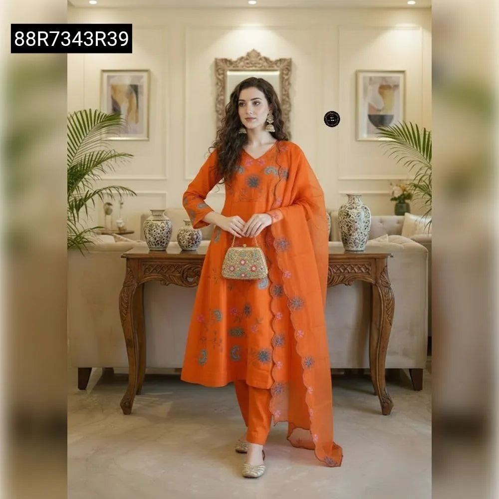Woman in orange embroidered viscose chanderi kurti set with dupatta, holding a clutch, front view.