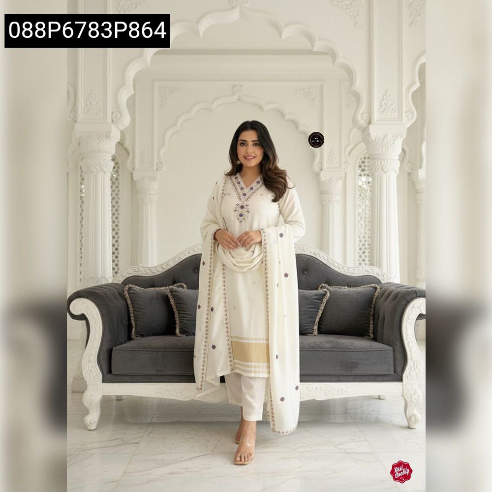Smiling woman in full-length cream embroidered viscose silk kurti set with dupatta, posing elegantly.