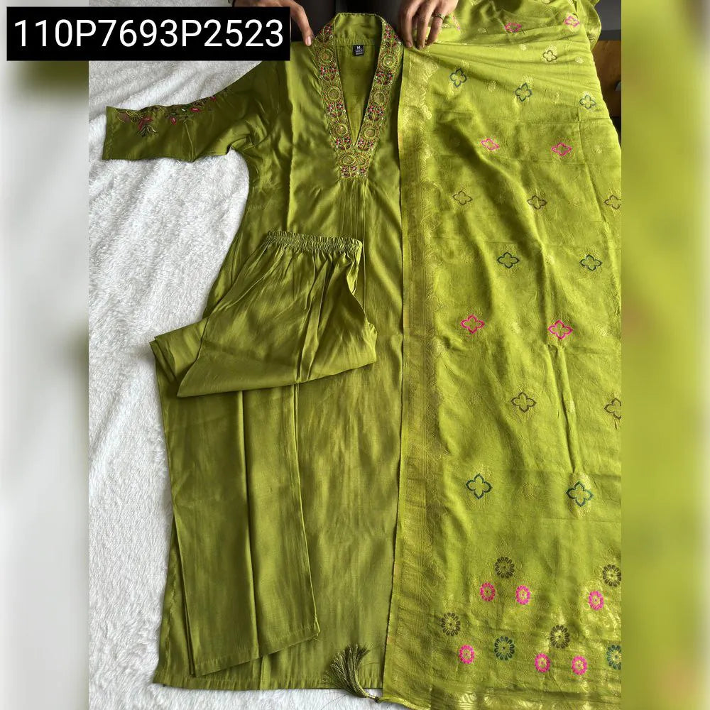 Overhead shot of the Light Mahendi Kurti set, with hands adjusting the fabric.
