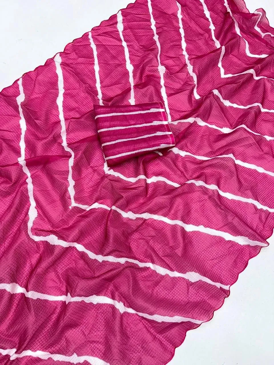 Hot pink bandhej laheriya printed kota doriya saree with matching blouse piece