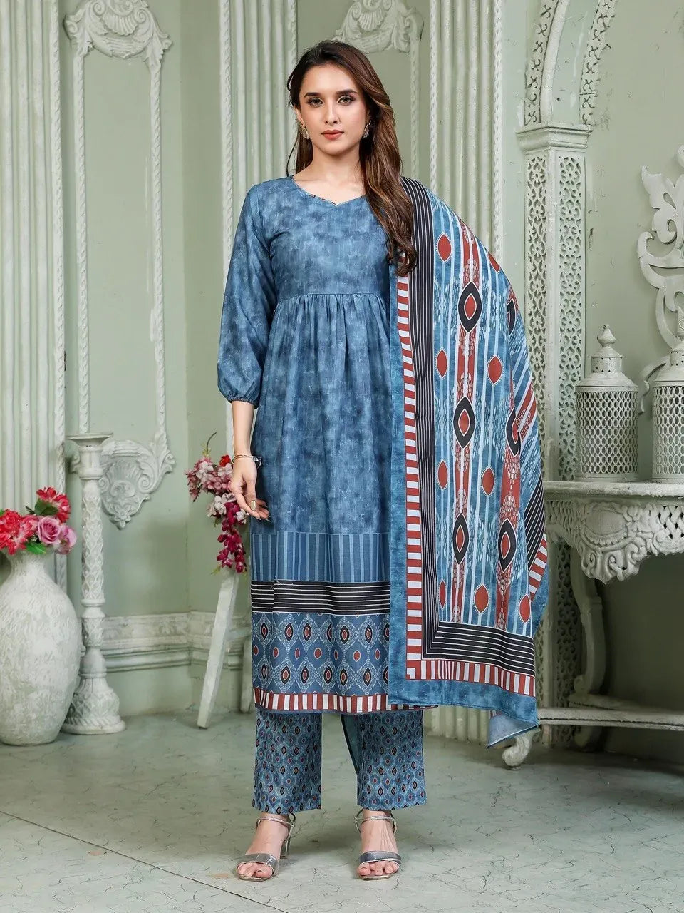 Model wearing blue straight cut cotton kurta set with printed muslin dupatta