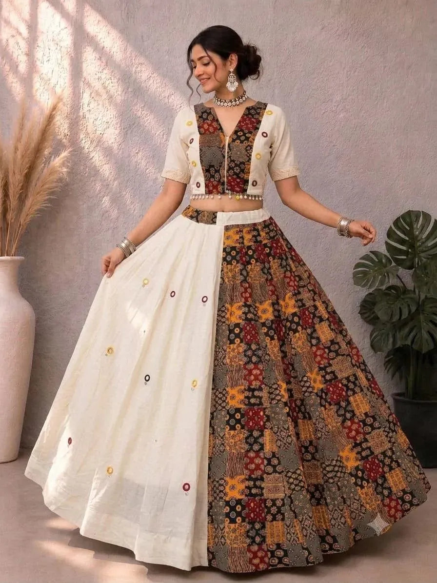 Model wearing white and multicolored Ajrakh cotton lehenga choli with mirror work