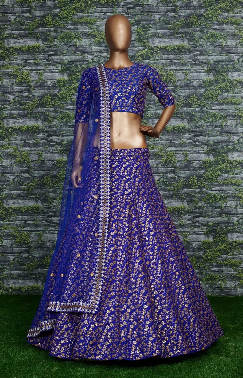 Mannequin displaying royal blue lehenga choli with net dupatta