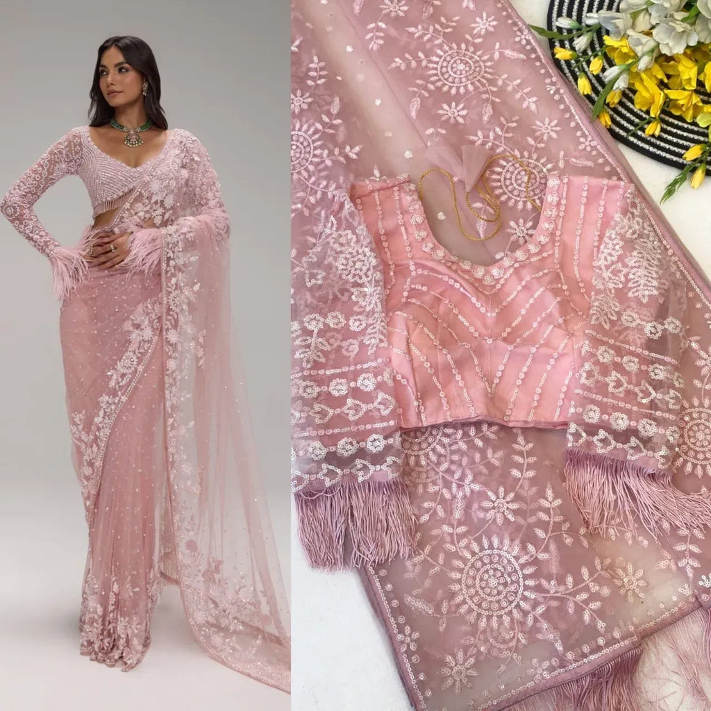 Pink net saree with heavy sequins work and matching blouse