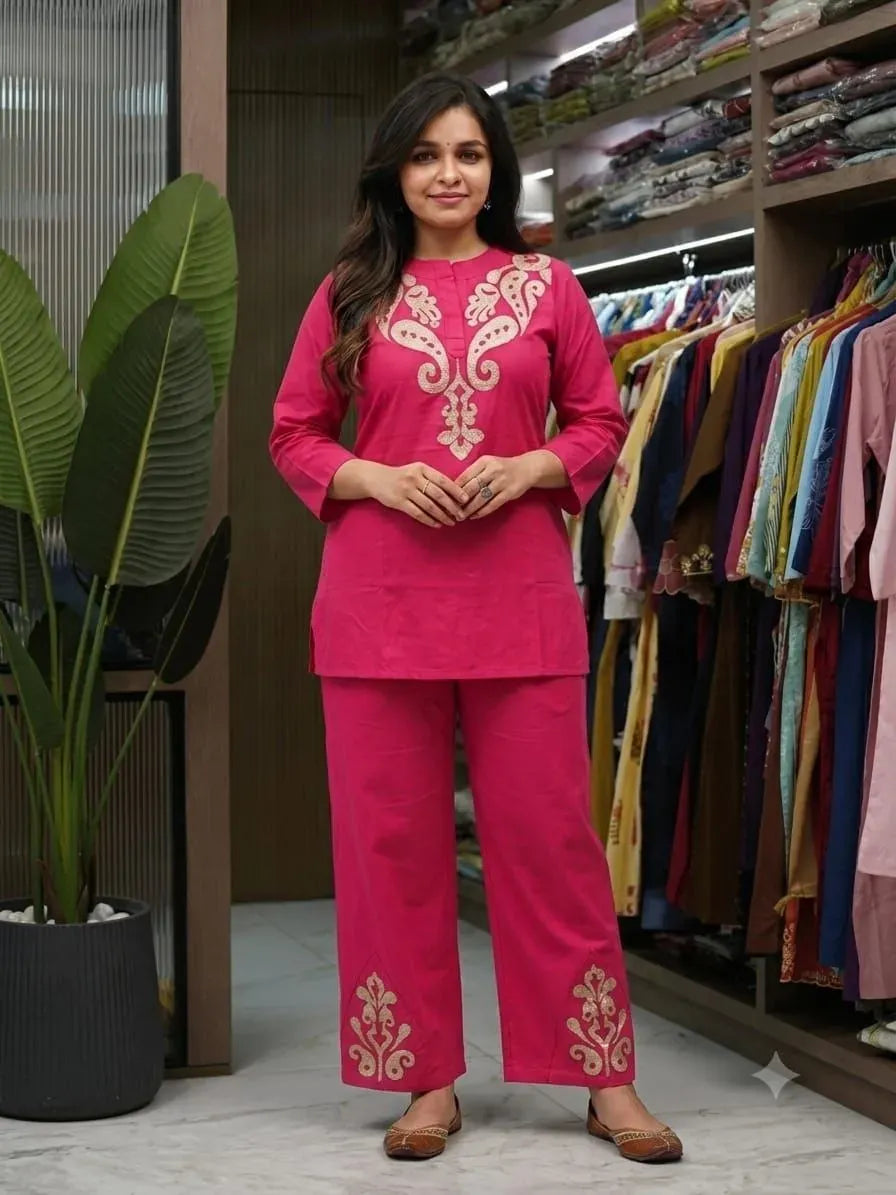 Model wearing hot pink dhabu print co ord set
