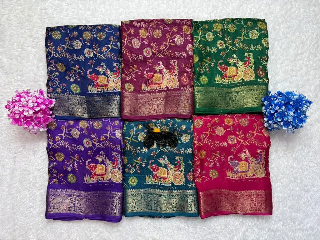 Collection of multiple colored georgette sarees folded neatly together